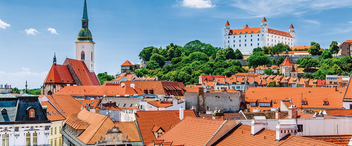 A view across the rooftops in Bratislava towards the castle